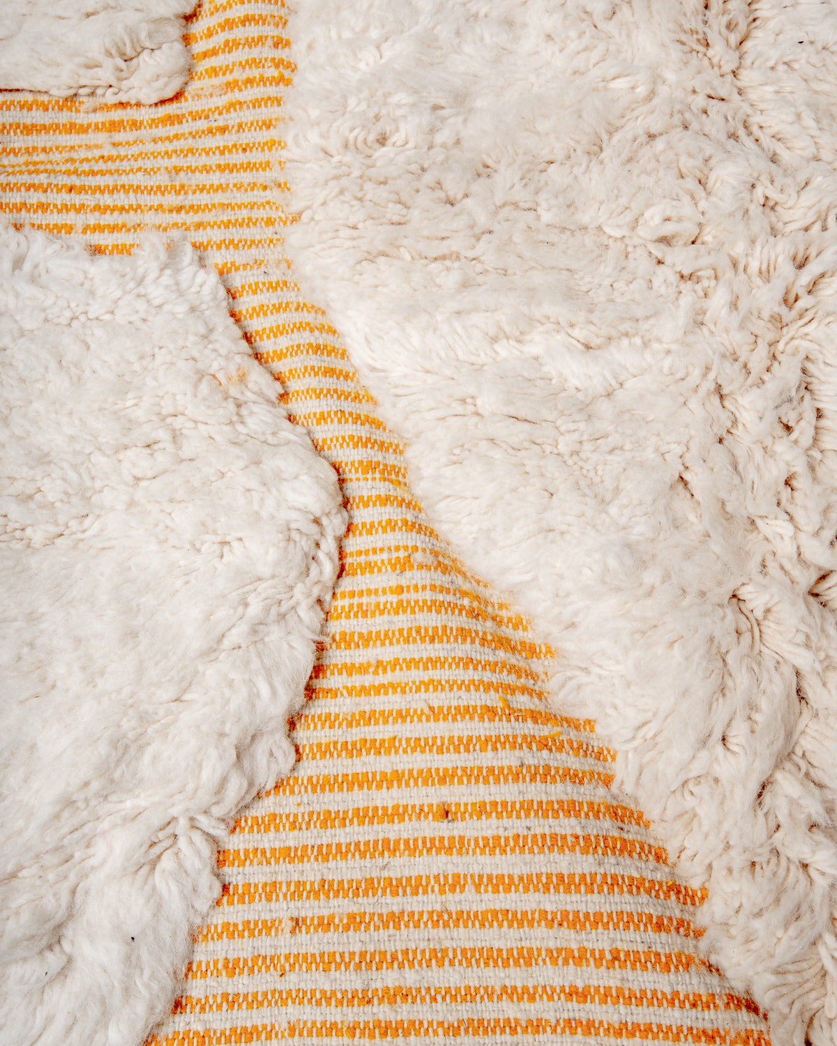 Modern, designer, handcrafted Berber rug from Morocco. Beniourain carpet with beautiful colours and patterns and fluffy wool texture.
